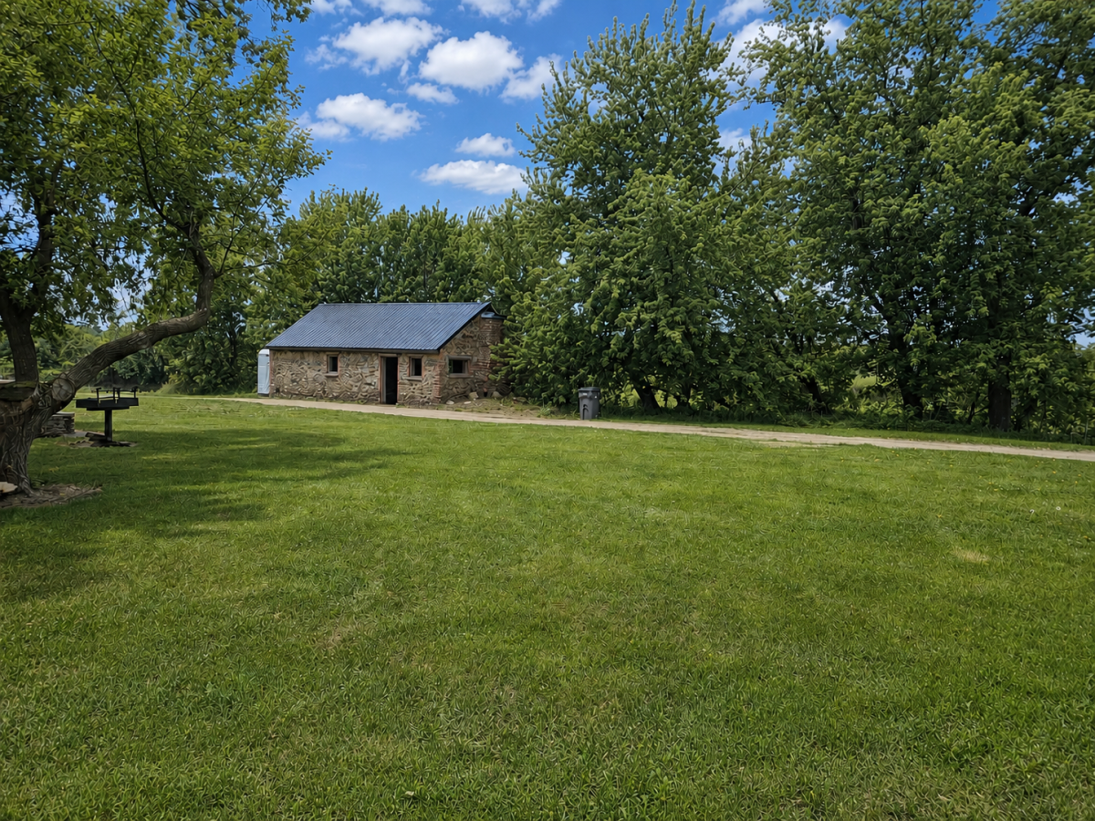 Serene countryside with stone cabin