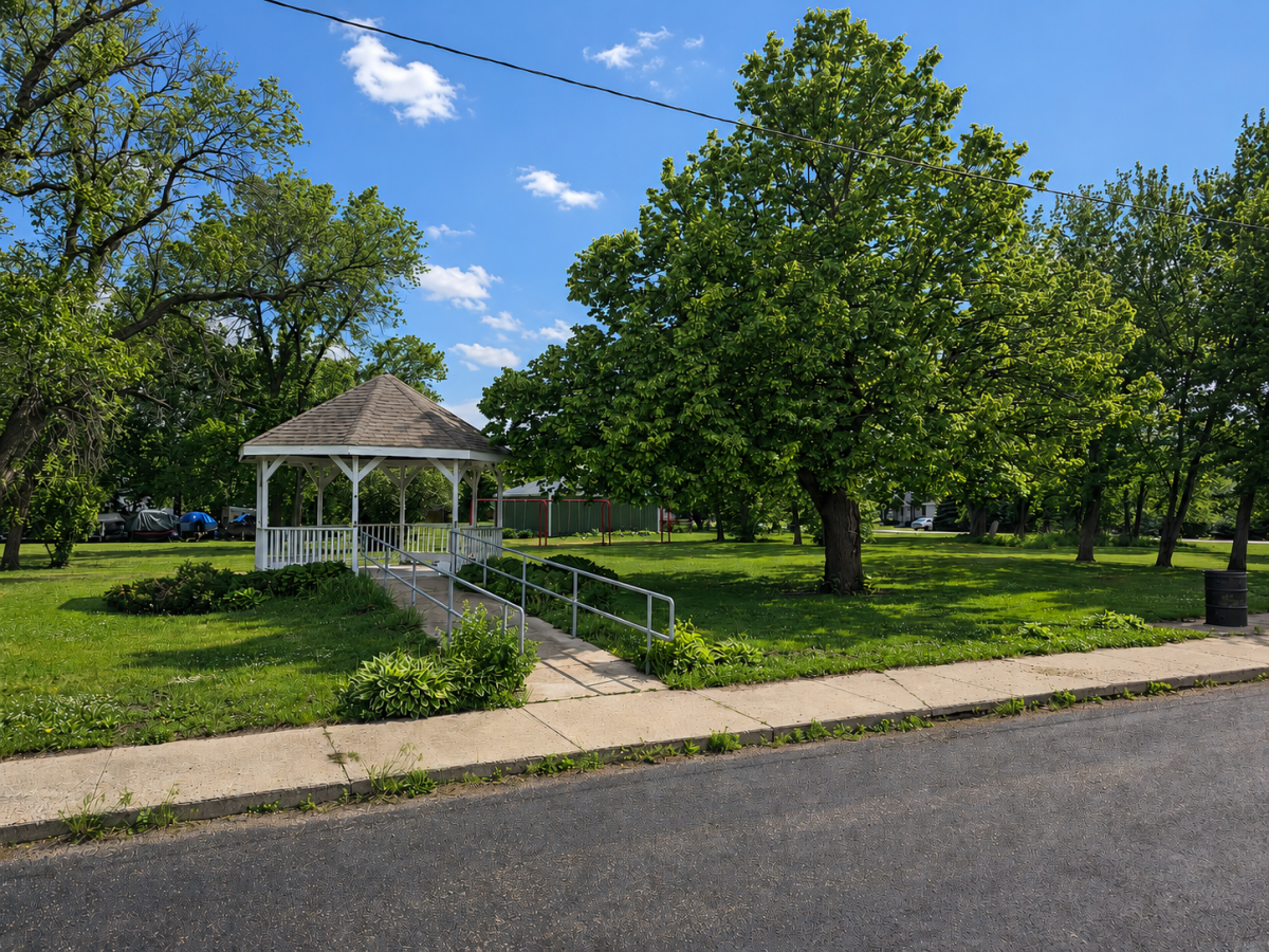 Sunny park with gazebo and playground